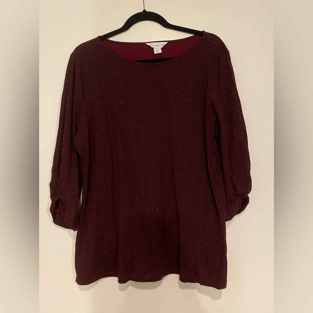 Dark red blouse with black pattern detail